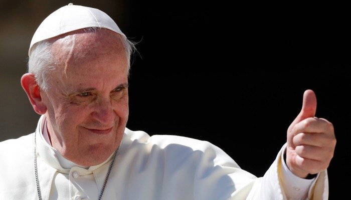 Pope Francis gives his thumb up as he leaves at the end of his weekly general audience in St. Peter's square at the Vatican, Wednesday, Sept. 4, 2013. (AP Photo/Riccardo De Luca)